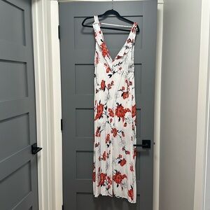 Impressions boutique dress. Beautiful ruffles aroundv-neck top and back of dress